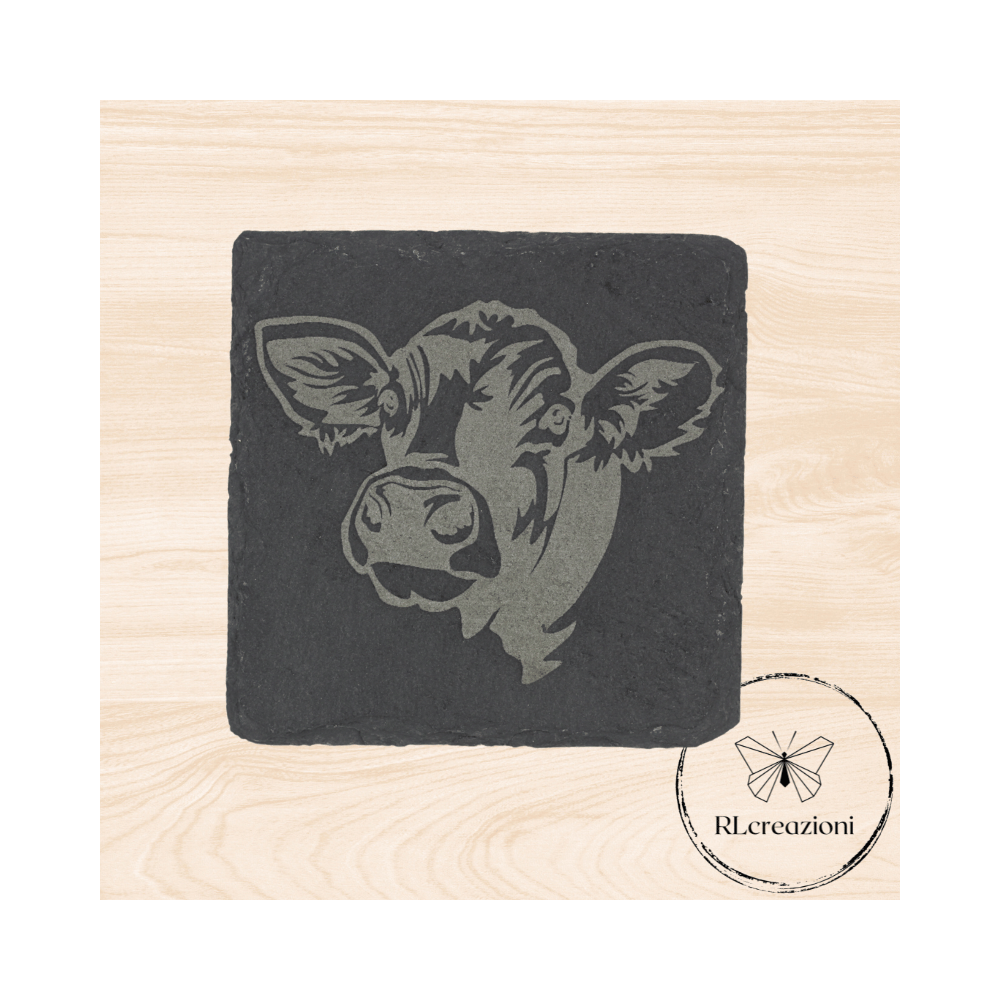 sous-verre en ardoise avec vache brune gravée au laser sous-verre en ardoise avec vache brune gravée au laser
