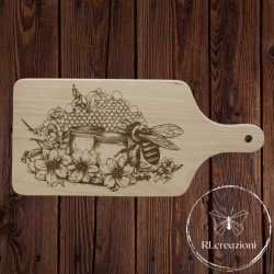 Planche à découper avec gravure laser 'miel et abeille'. Personnalisation sur demande