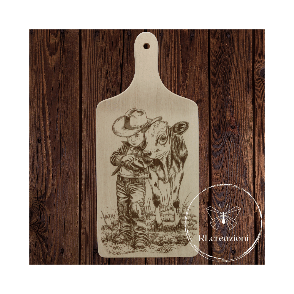 tagliere in legno di faggio inciso con il laser. Bambino con mucca. Cowboy
