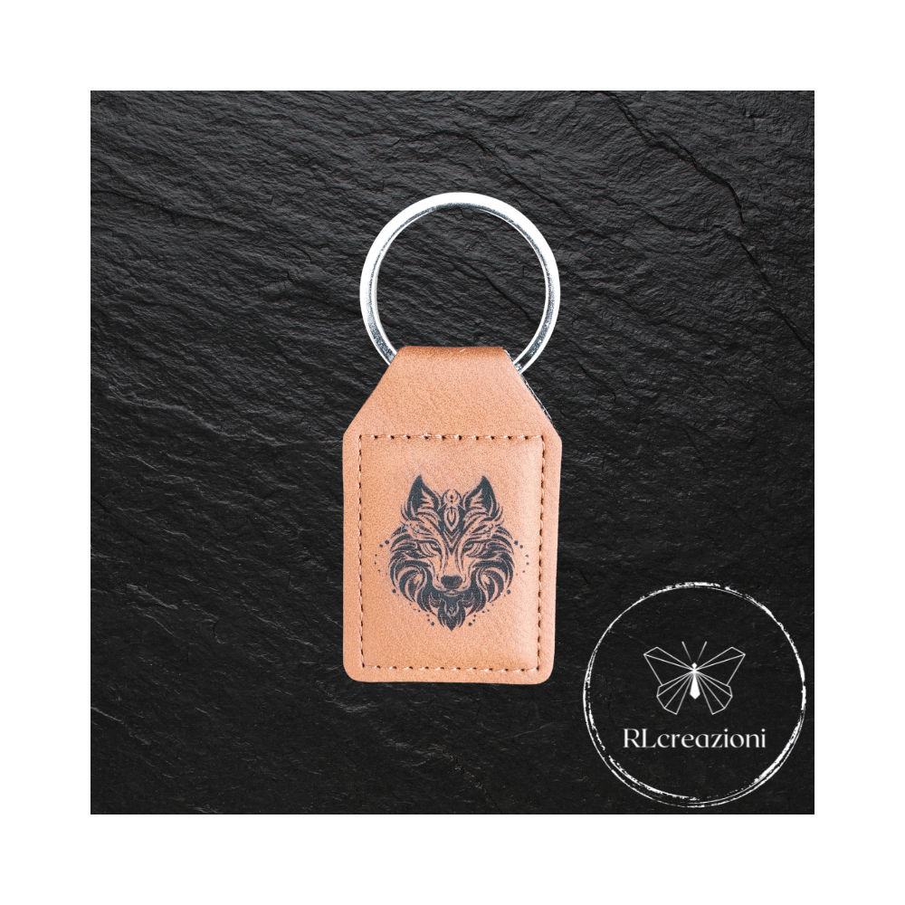 Porte-clés en simili cuir avec gravure laser. Loup. Personnalisables. Idéaux comme gadgets d'entreprise.